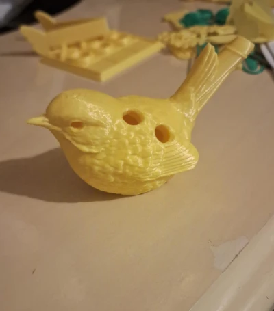 Passarinho flauta amarelo